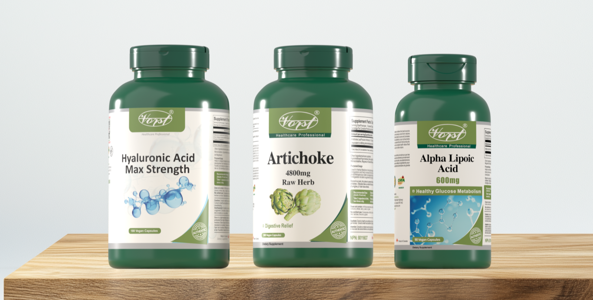Three supplement bottles on a wooden stand with a white background